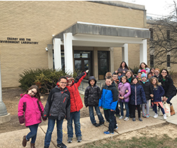 group of students outside a lab